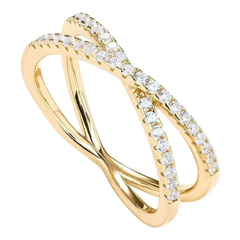Silver cross ring with diamond accents in half circle wide band design on white background