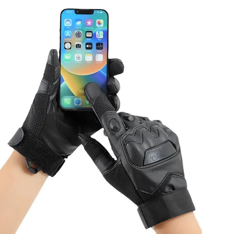 Men's black tactical training gloves with full finger design and touch screen-compatible fabric on a solid background.