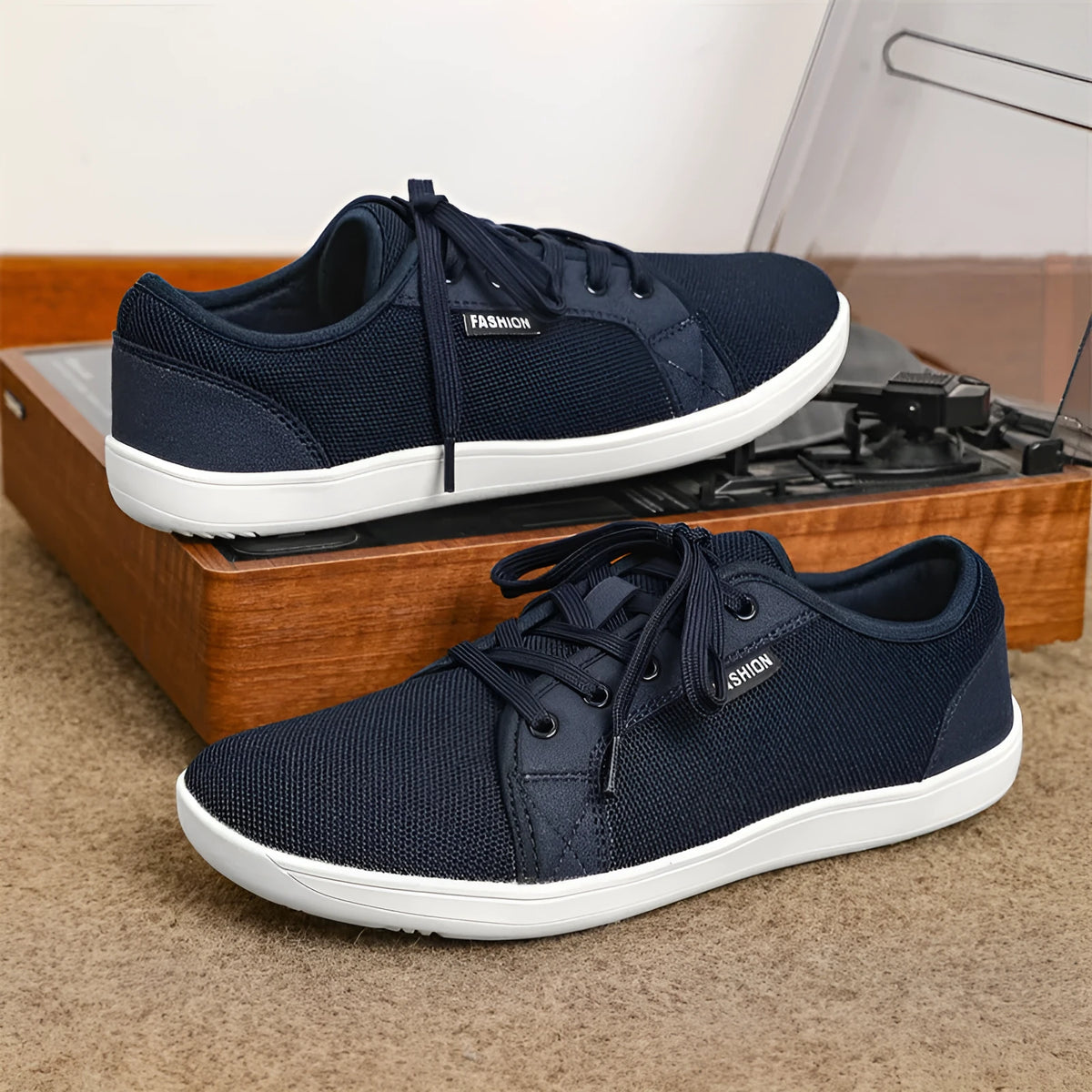 Men's low-top lace-up leisure sneaker with mesh upper, rubber sole, wide toe, flat heel, in black colour