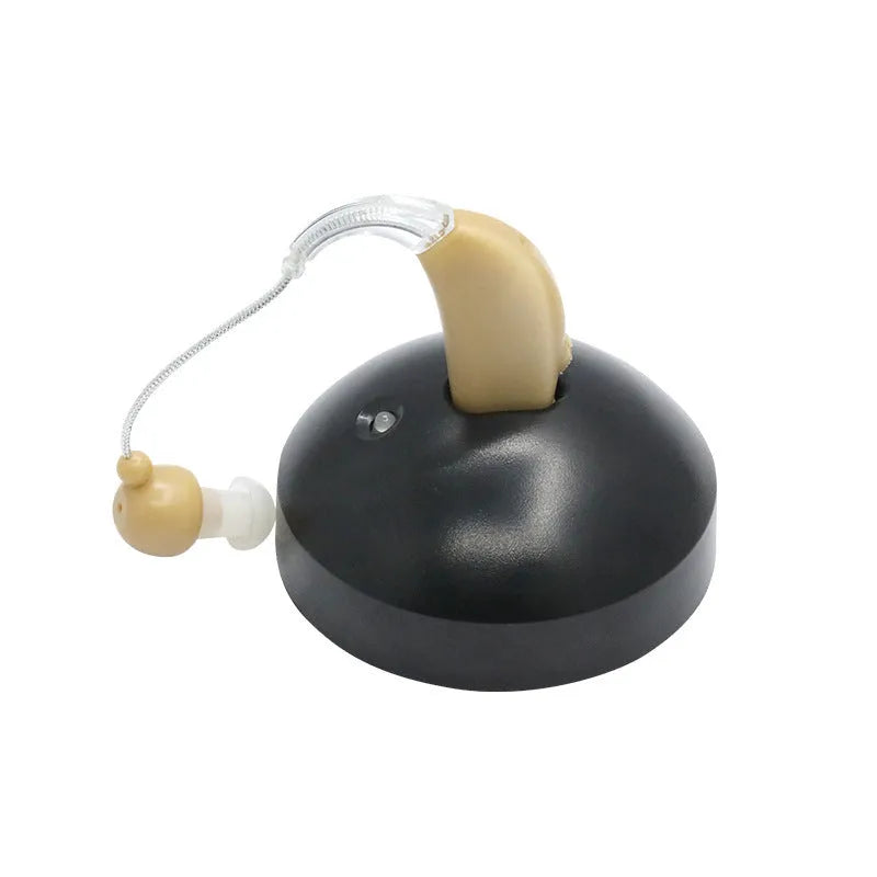 Black rechargeable hearing aid amplifier with silicone housing and charging cable