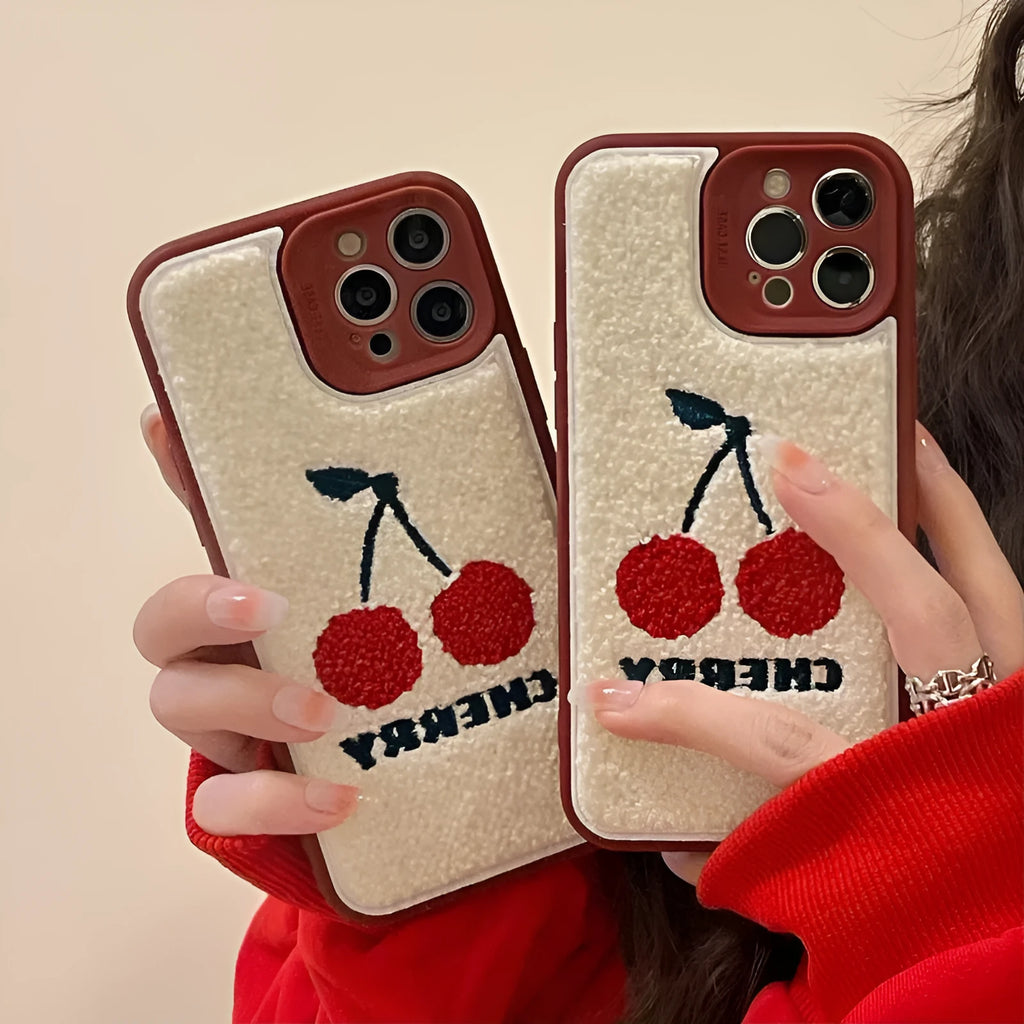 Red plush full lens phone case with cherry design for iPhone showing camera module coverage