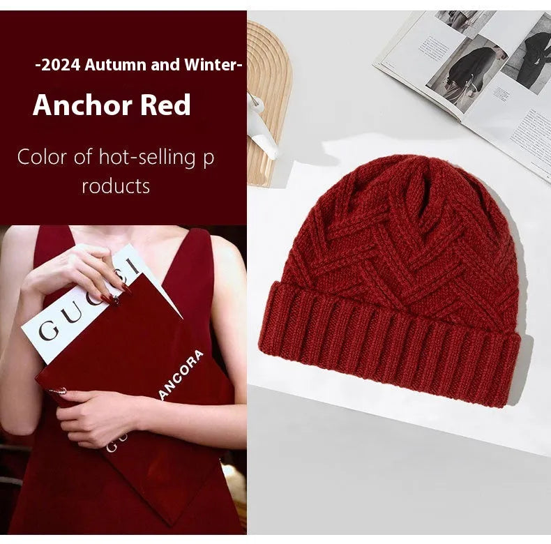 Wool knitted dome hat in ankela red colour with totem pattern detail