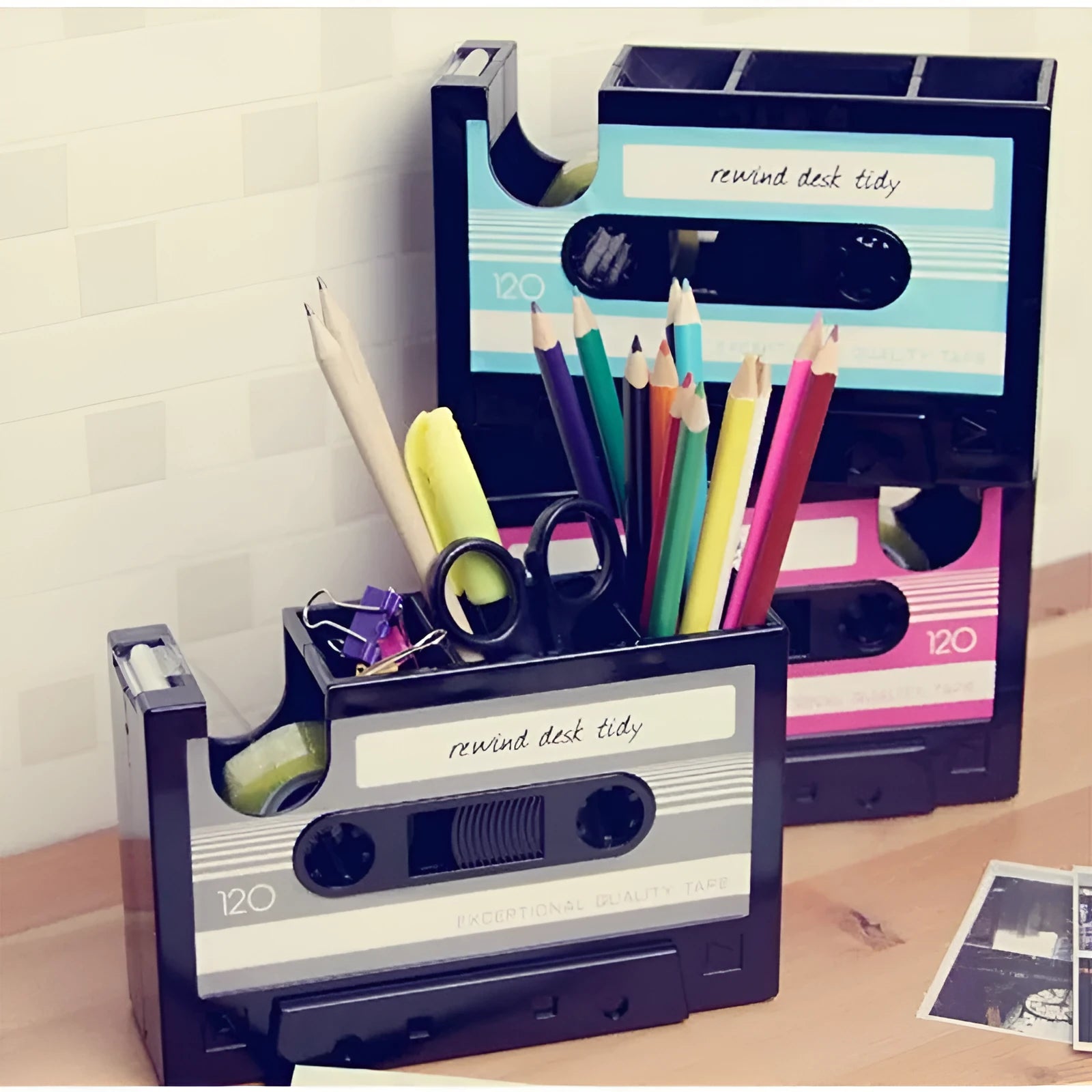 Multifunctional plastic pen holder storage box in blue, small size 17x5x11.5cm on a desktop with stationery and cables