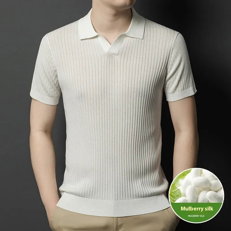 Man wearing a striped mulberry silk lapel T-shirt in grey, showing short sleeves and a straight fit.