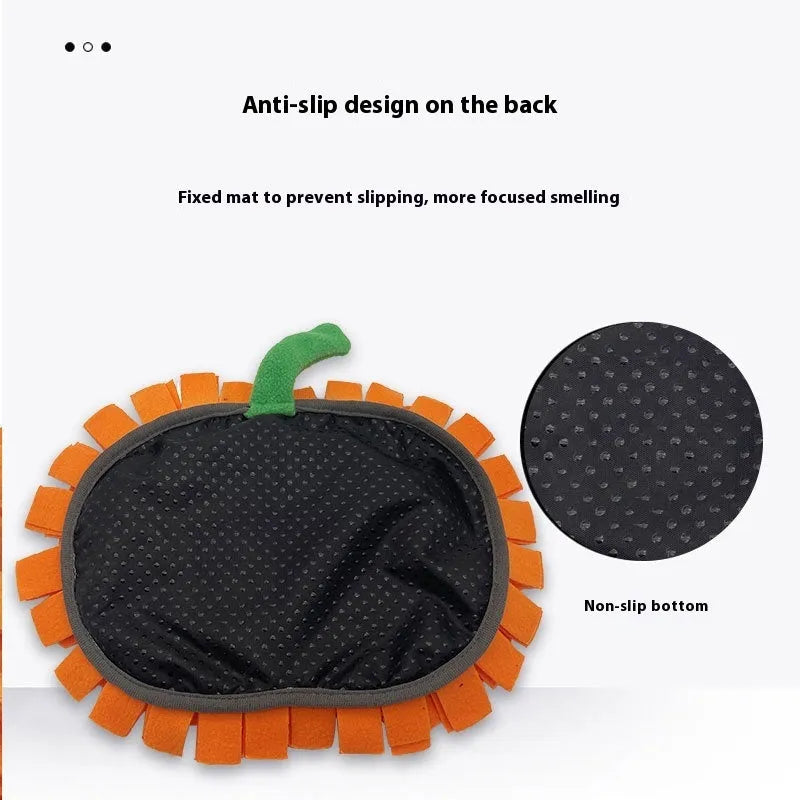 Orange pumpkin-shaped dog slow feeder mat with fleece texture on wooden floor