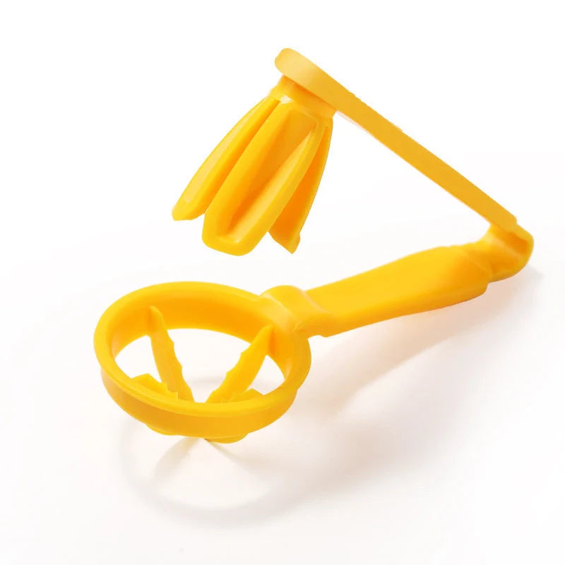Manual tomato slicer with serrated knife for even dicing, available in red and yellow
