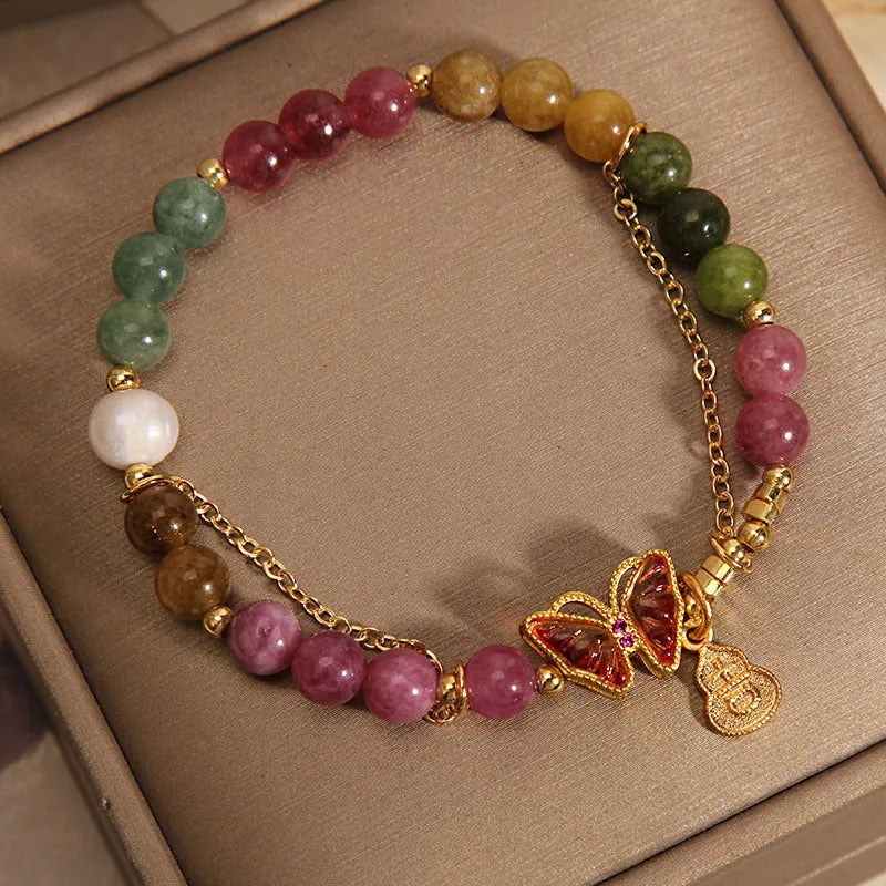Natural jade green agate bracelet with a carved tourmaline butterfly gourd centrepiece.