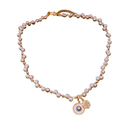 Gold electroplated necklace with white round pearl pendant on clavicle chain