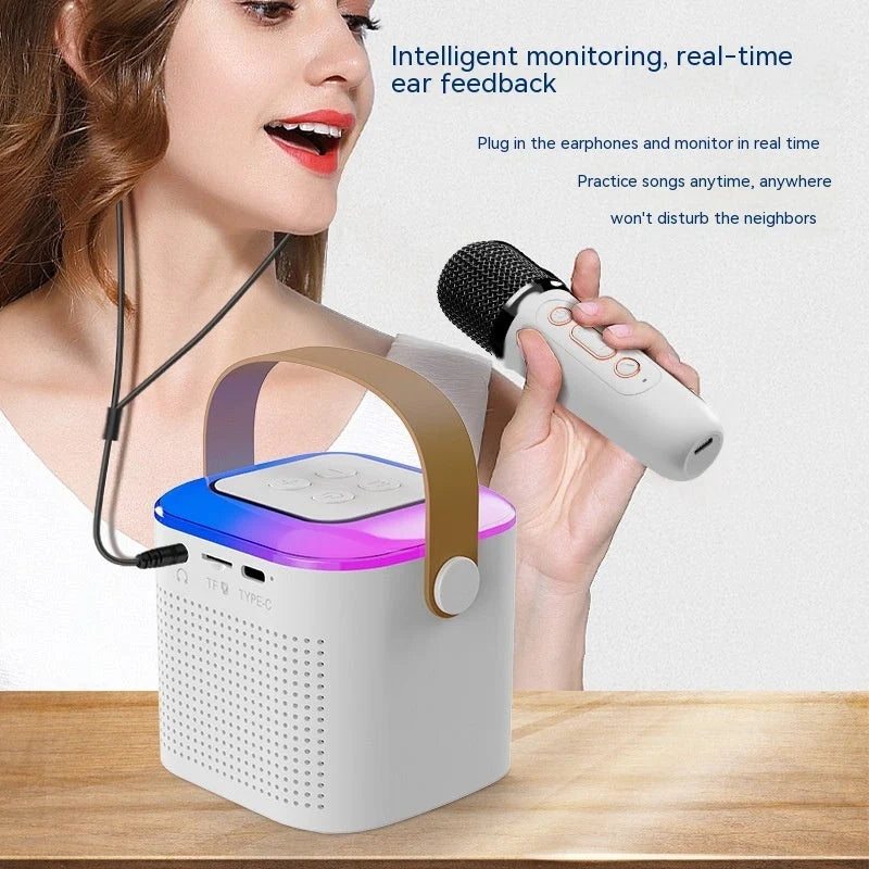 Portable karaoke machine with dual wireless microphones and RGB lighting