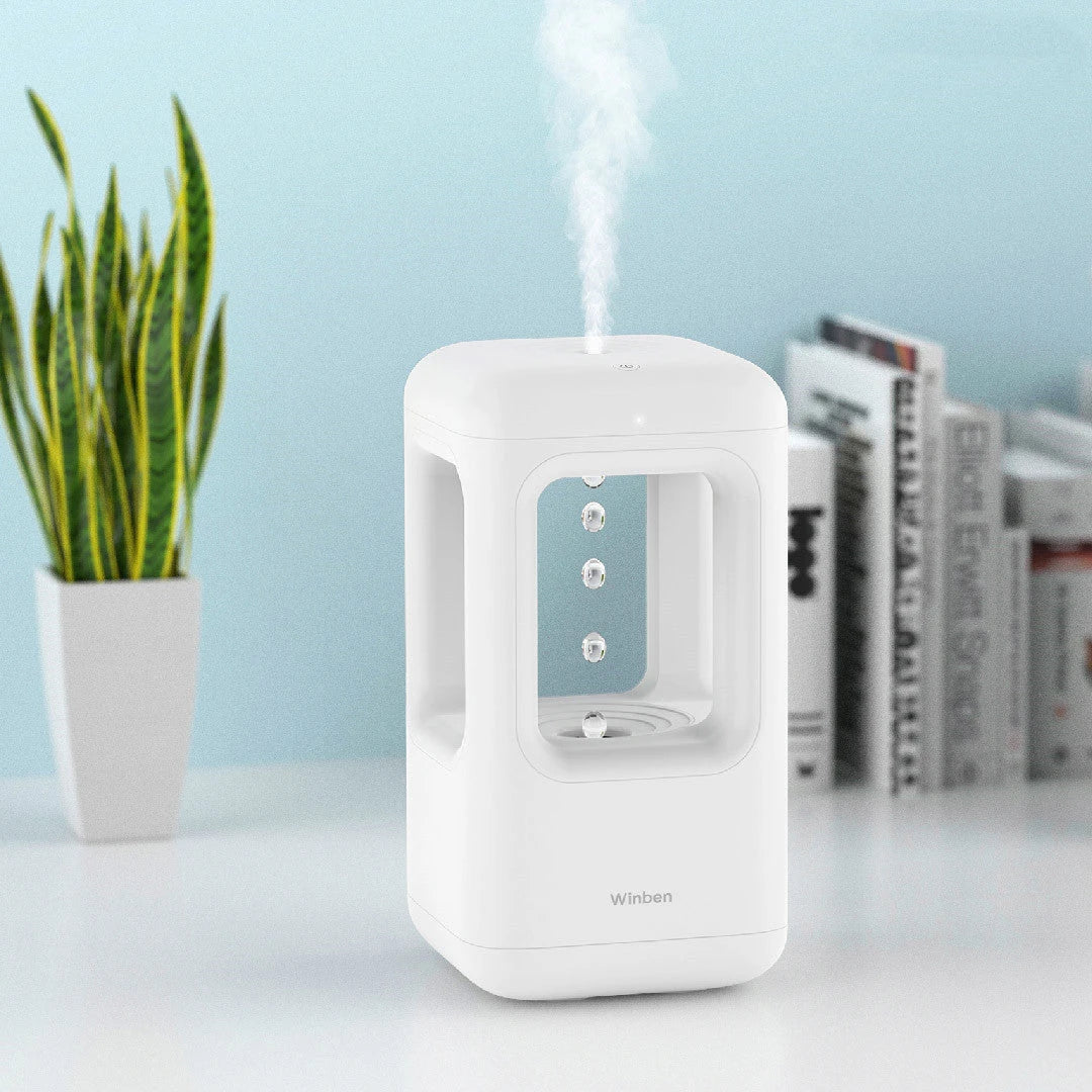 Whisper-quiet humidifier with captivating water drop effect, designed for optimal air quality and soothing ambiance in the bedroom