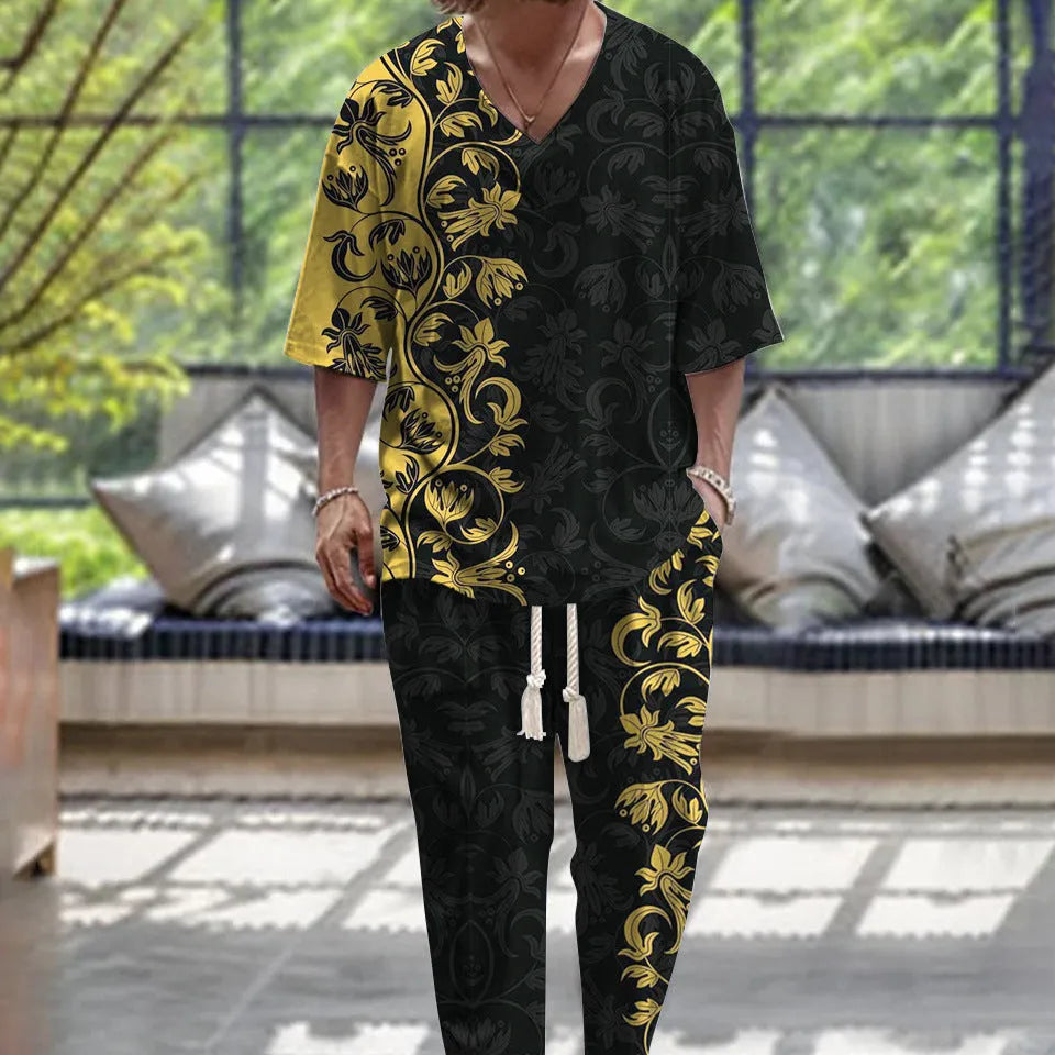A person wearing a V-neck cropped sleeve jacket and matching trousers in a light colour.