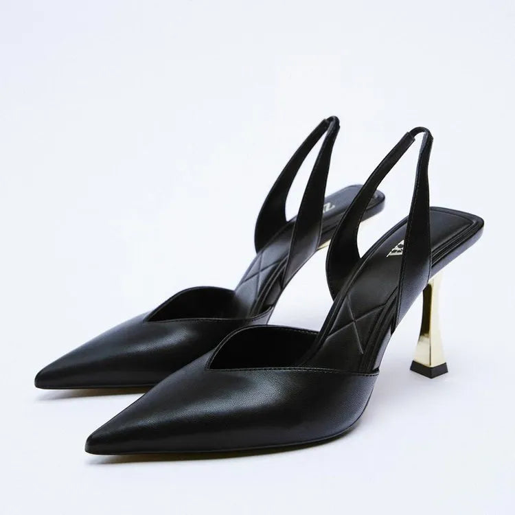 Women's pointed toe high heels in apricot colour with a shallow mouth design and glossy patent leather upper.