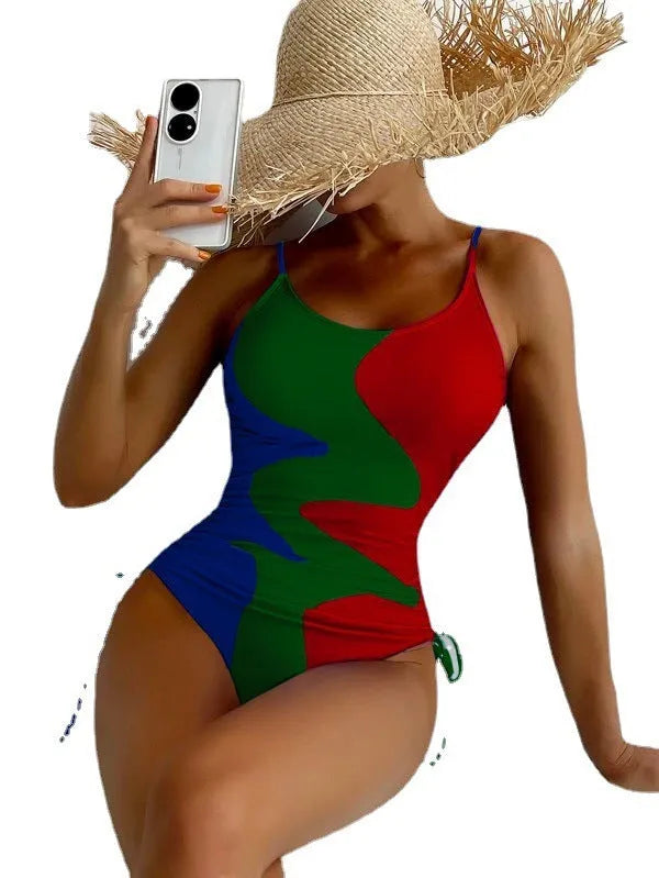 Blue sleeveless backless one-piece swimsuit for women on a mannequin, showing the tight-fitting striped design.