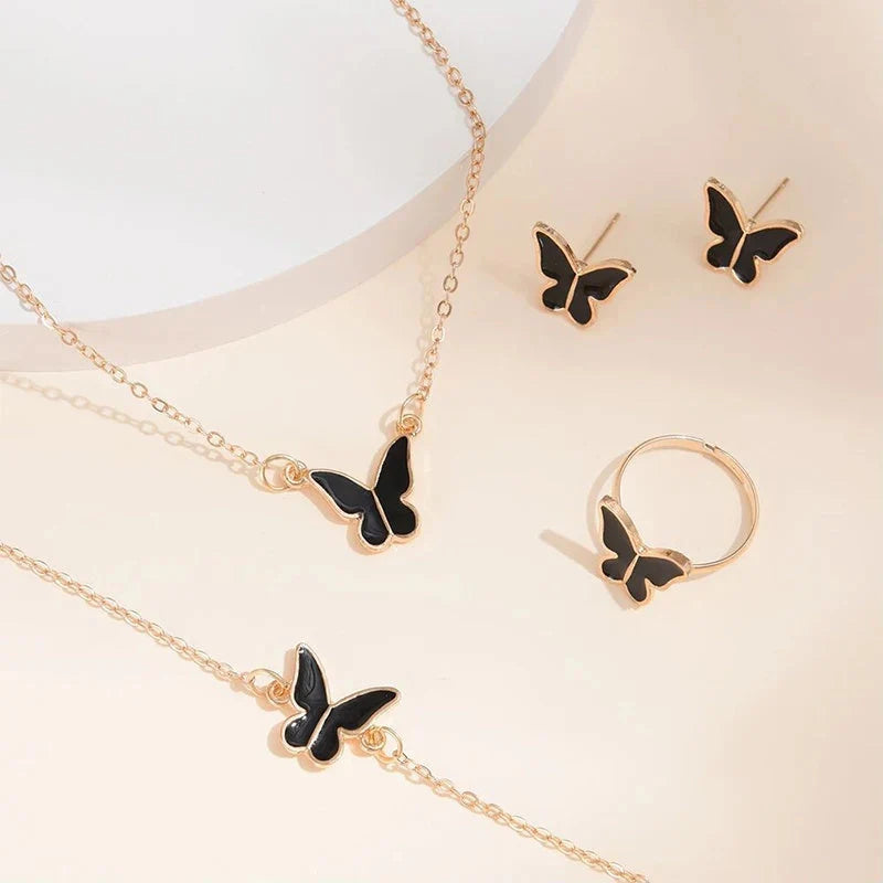 5-piece butterfly pendant jewellery set for women, including necklace, earrings, ring, and bracelet in various colours