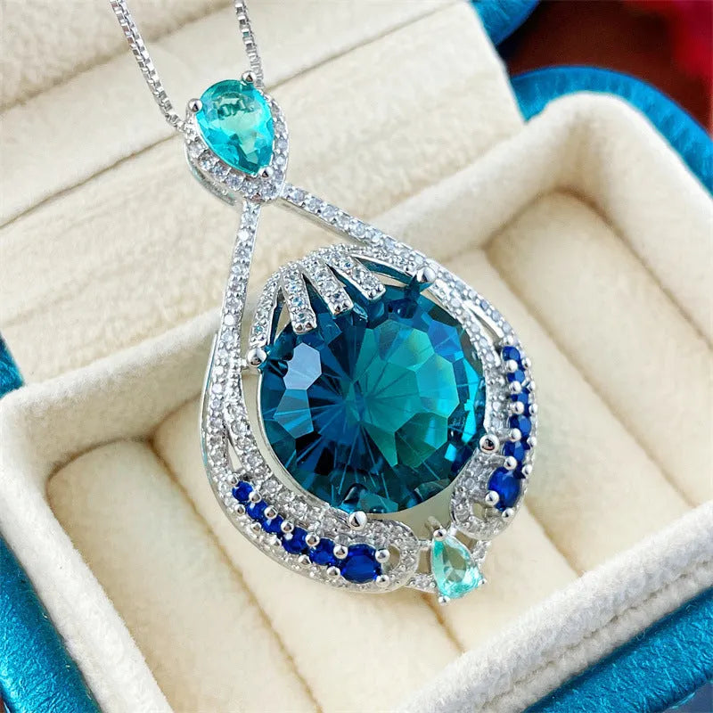 Blue crystal geometric necklace with fireworks cut gemstone on water wave chain