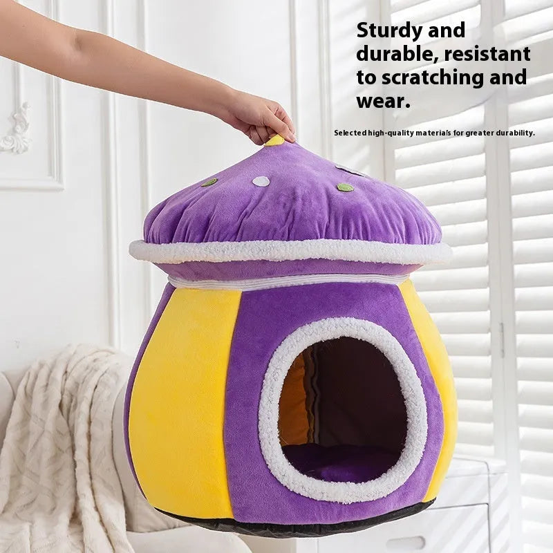 Grey mushroom-shaped plush cat bed with a detachable blanket, shown in a domestic setting.