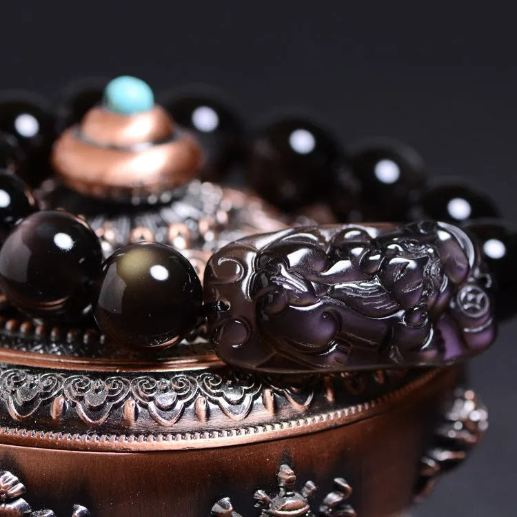 Polished crystal Pi Xiu bracelet with geometric beads in ethnic unisex style.