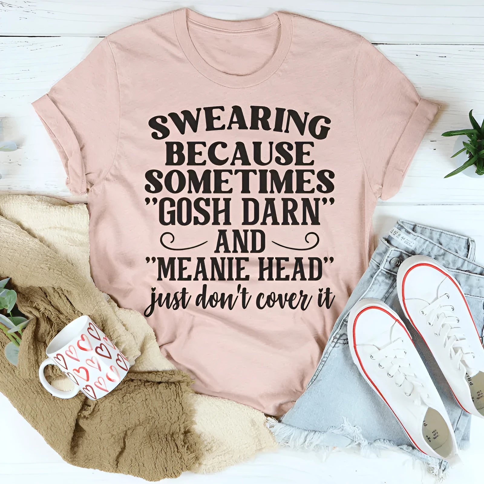 Pink couples T-shirt with a printed design, short sleeves, and a straight casual cut.