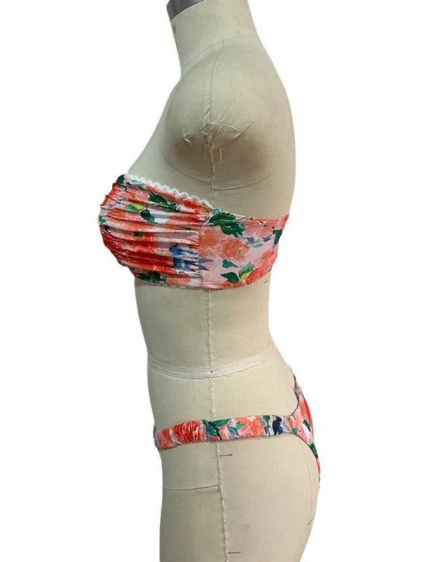 Blue floral print women's bikini set with lace trim on sleeveless tube top and matching briefs.
