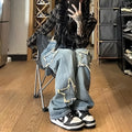 Blue high-waist wide-leg denim jeans with straight cut on hanger