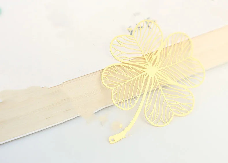 Brass metal bookmark with hollow plating leaf design and rose gold tassel