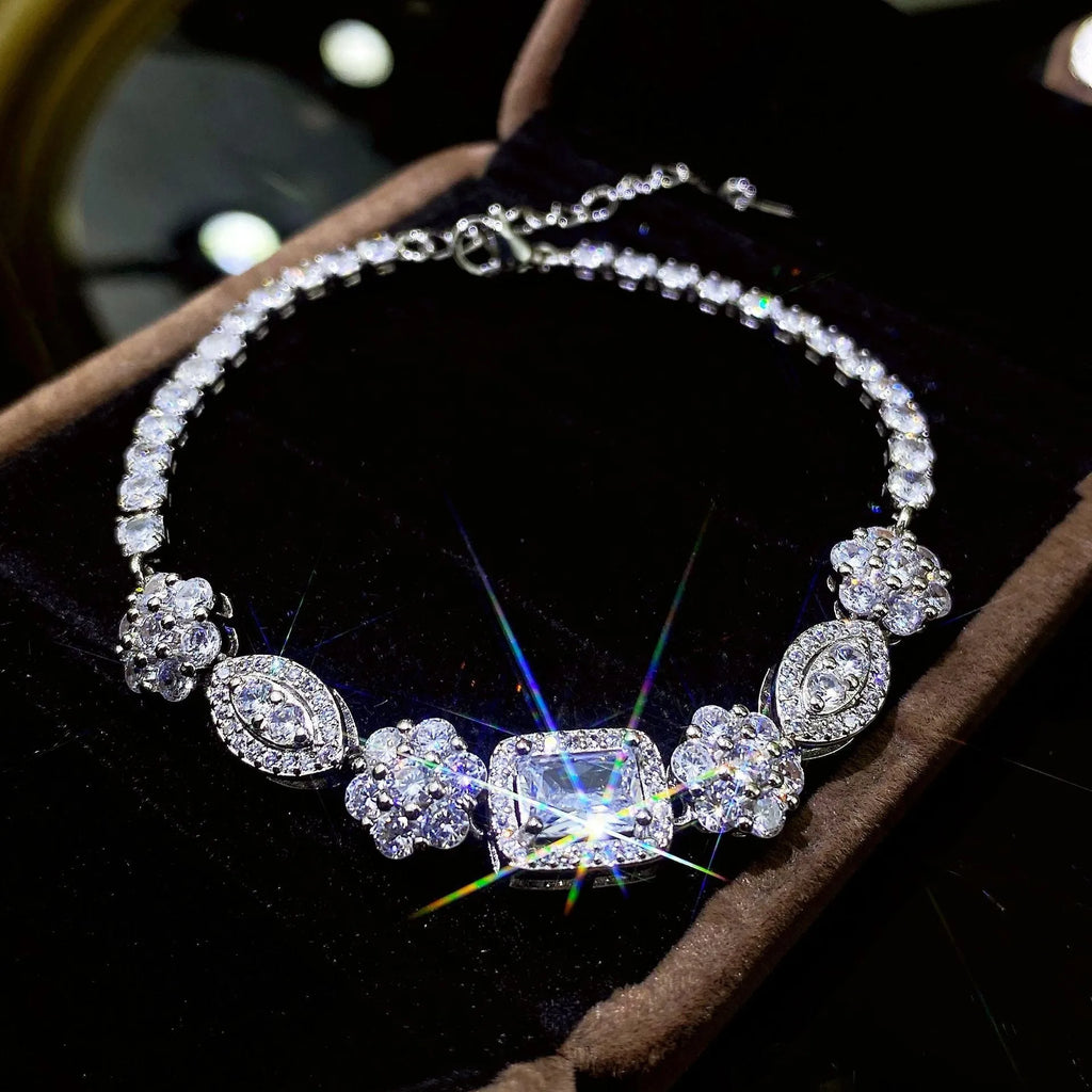 Women's silver-plated bracelet with sparkling zircon stones in a geometry shape.
