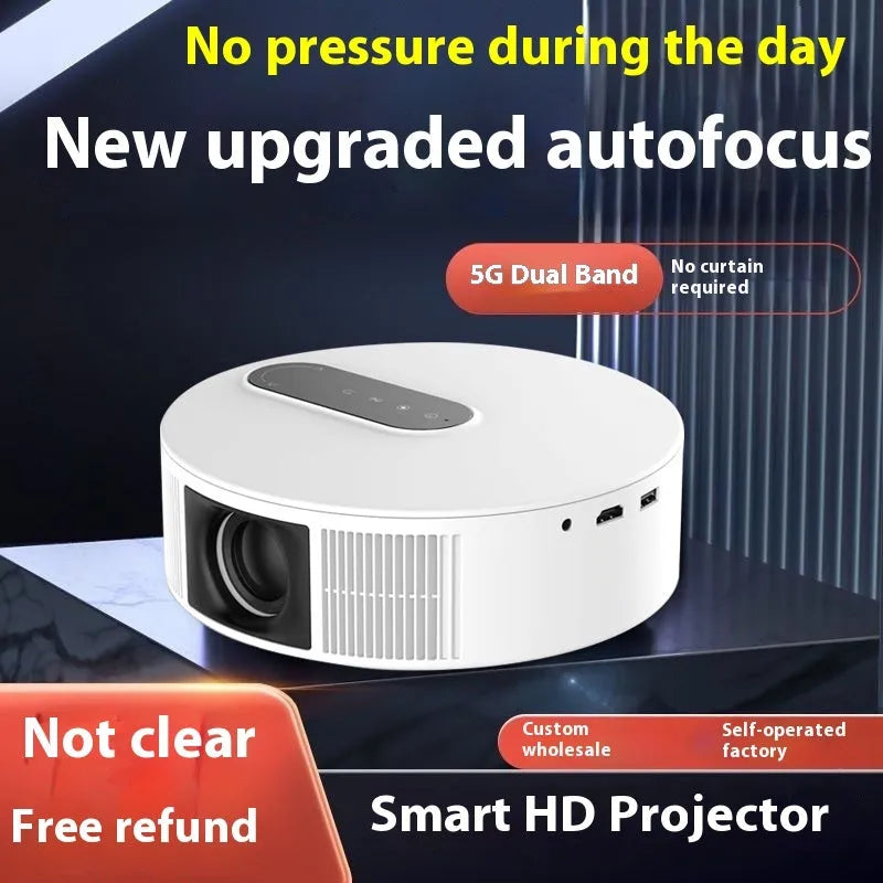 White 720p HD home theatre projector with remote control on a wooden surface.