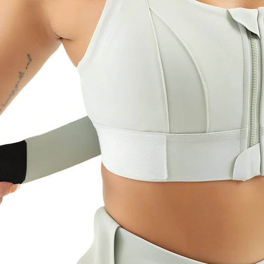 Women's black seamless sports bra with front zipper closure for high-impact workouts