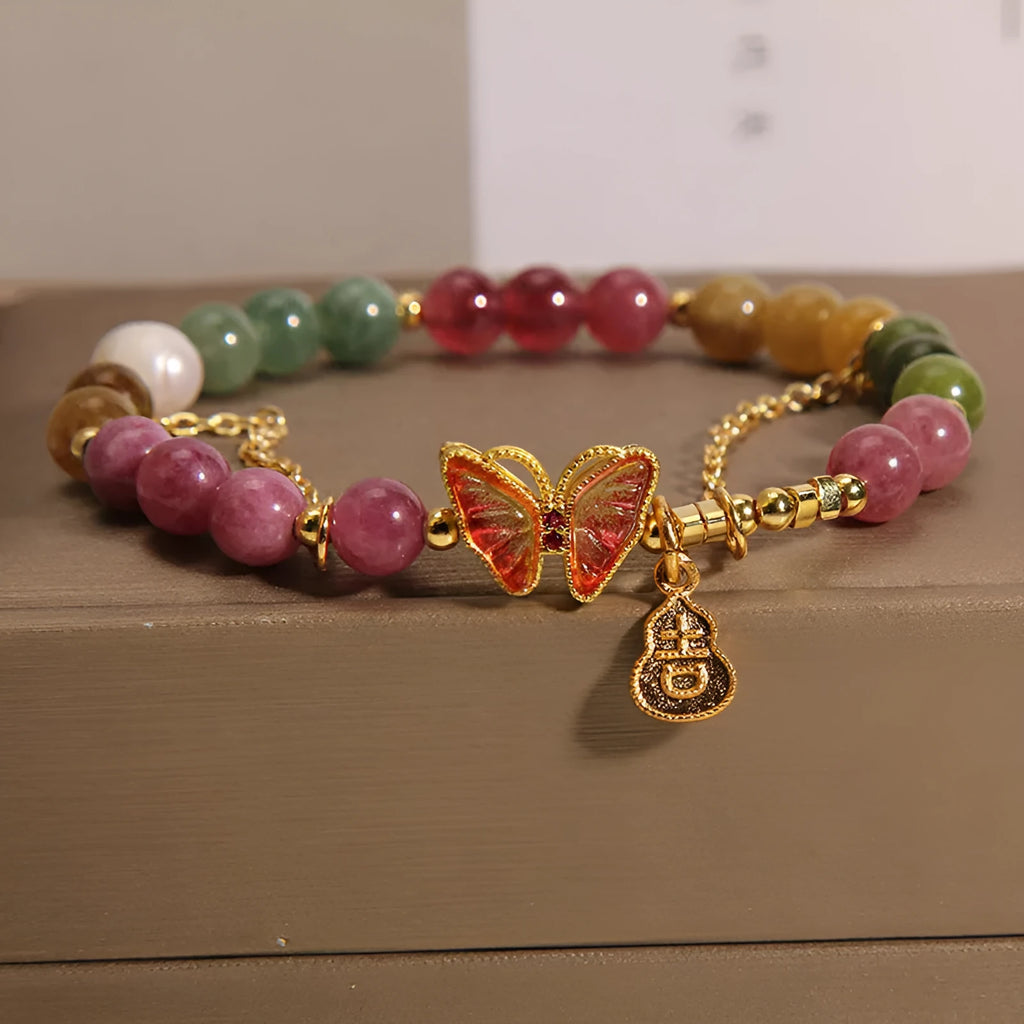 Natural jade green agate bracelet with a carved tourmaline butterfly gourd centrepiece.