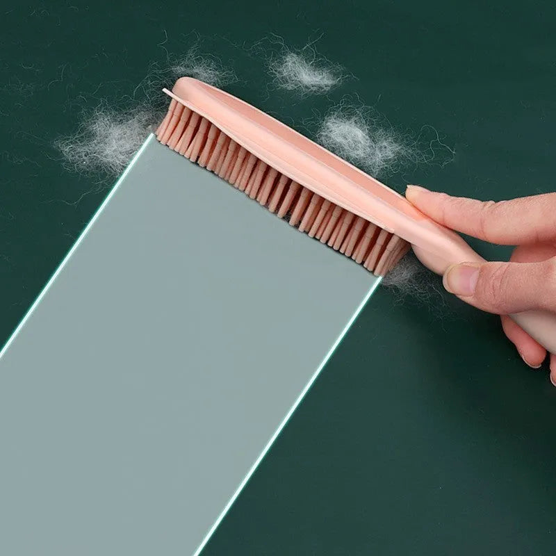 Green dog brush with grooming comb, massage pins, and removable sticky roller for pet hair removal