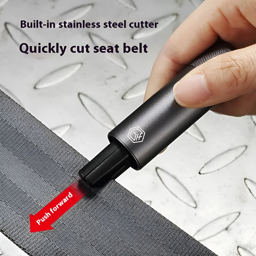 Gun grey aluminium alloy automobile safety hammer with steel impact head, shown with test glass and rubber mount.