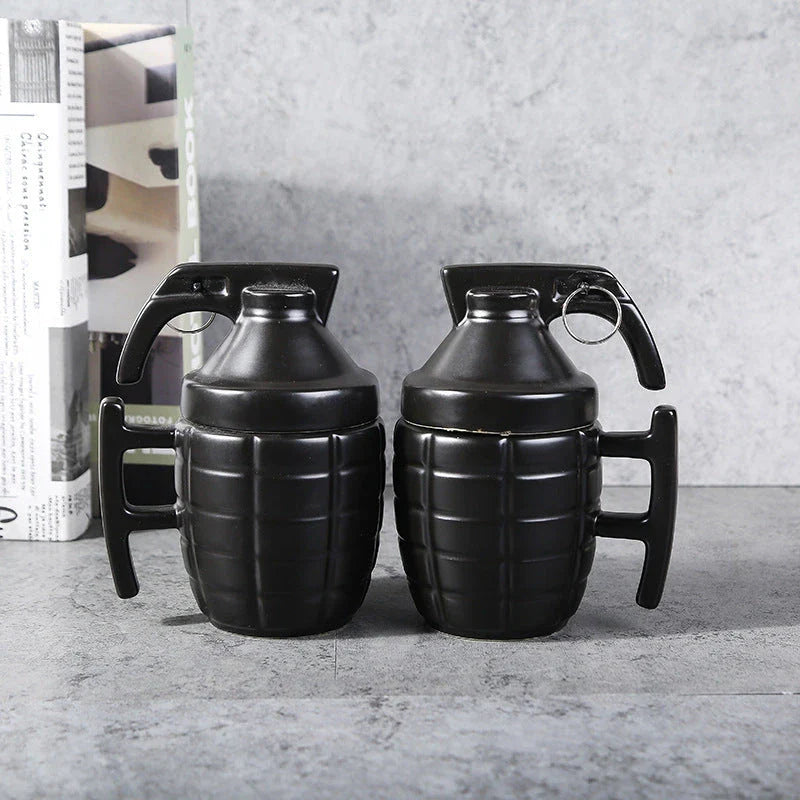 A grenade-shaped ceramic coffee mug with a lid, featuring a military-inspired design for a unique and tactical look.