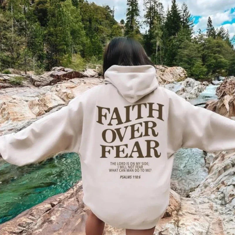 Inspirational Christian hoodie with 'Faith Over Fear' graphic in various colors