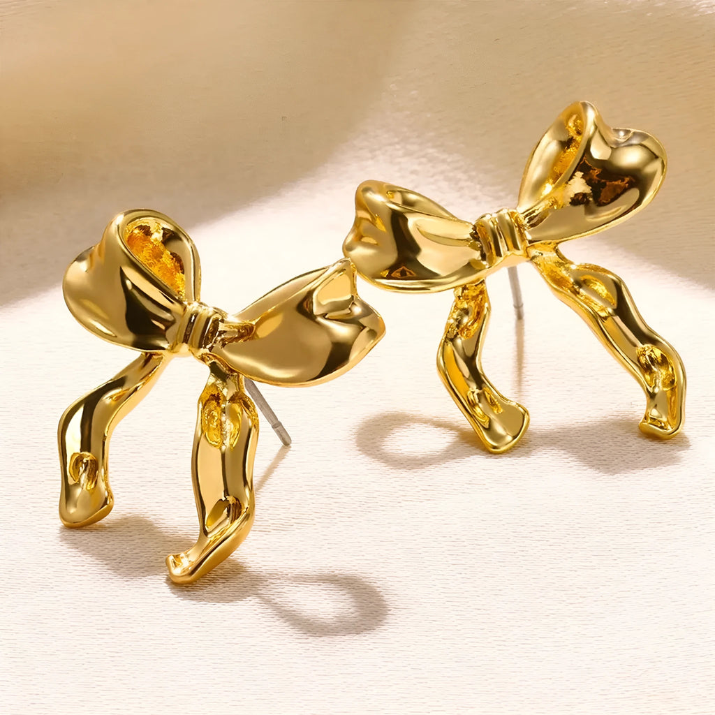 Gold bow earrings simple style alloy with electroplated finish