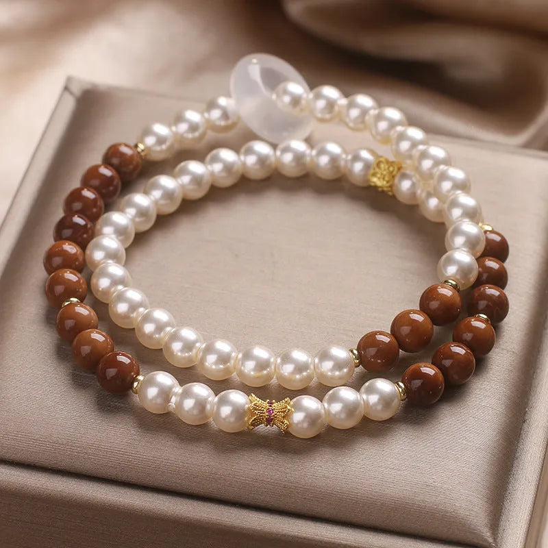 Natural white freshwater pearl and crystal double circle cook stitching flexible bracelet on woman's wrist, 34cm circumference