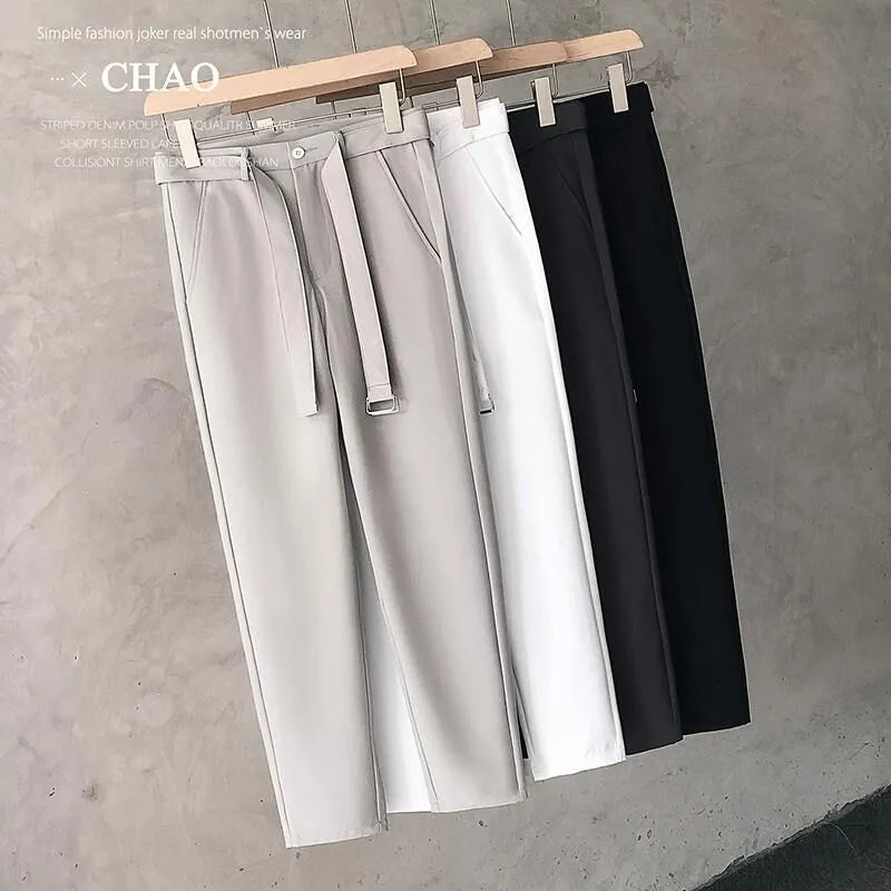 Boys slim straight tapered wool trousers in grey, shown with a straight leg opening.