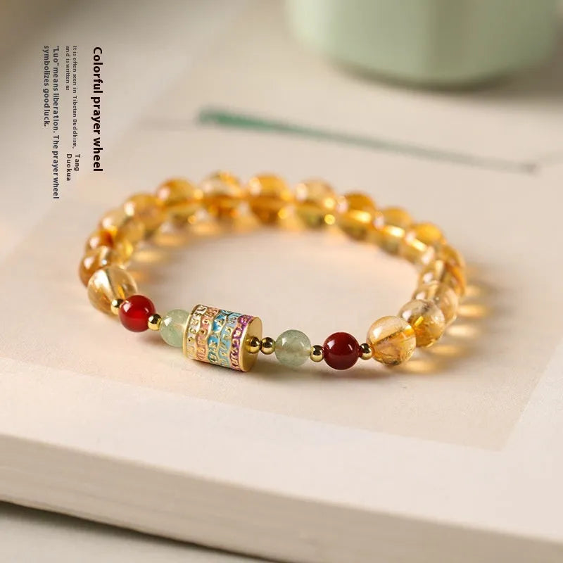 Women's citrine bracelet with 8mm prayer wheel design in yellow retro style