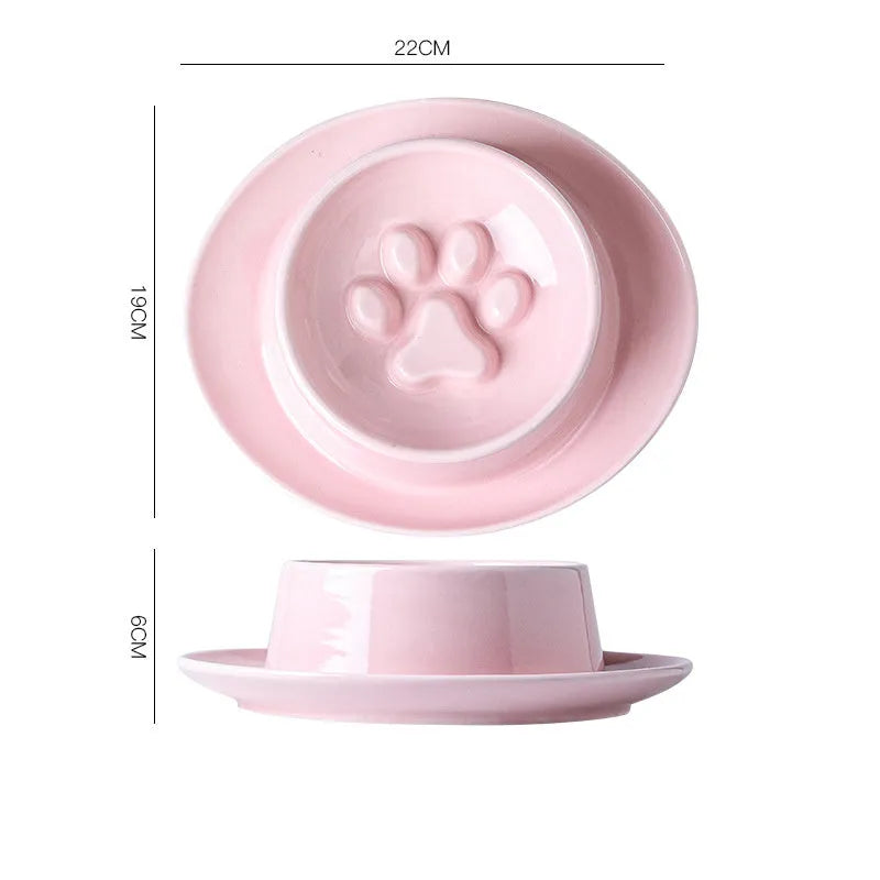 Ceramic slow feed pet bowl in green with internal ridges and neck protection design.