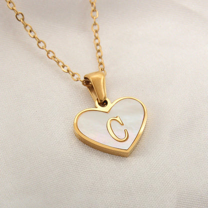 Personalized 26-letter heart-shaped necklace made of stainless steel and white shell