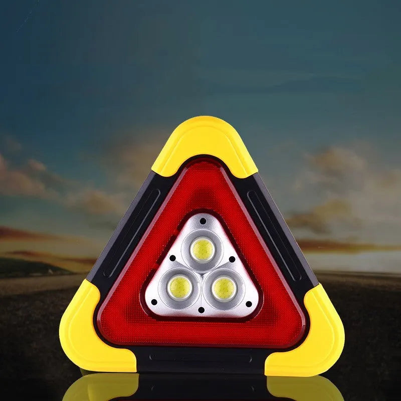 Car mounted tripod warning sign light with solar panel, large and small sizes, showing warning flash mode on a roadside