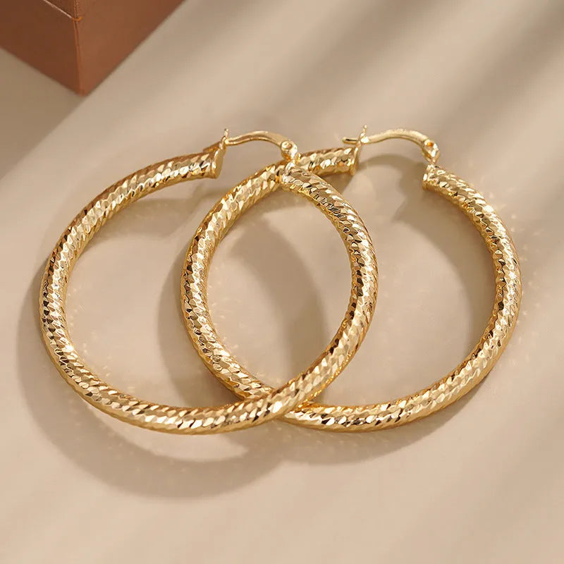 Copper geometric drop-shaped ear clip with electroplated finish for women
