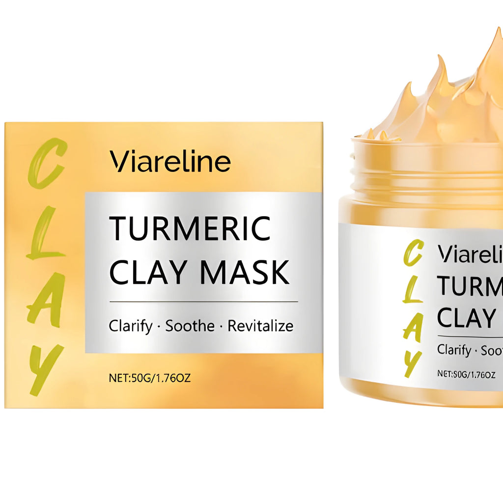 Yellow turmeric mud face mask in jar with applicator brush
