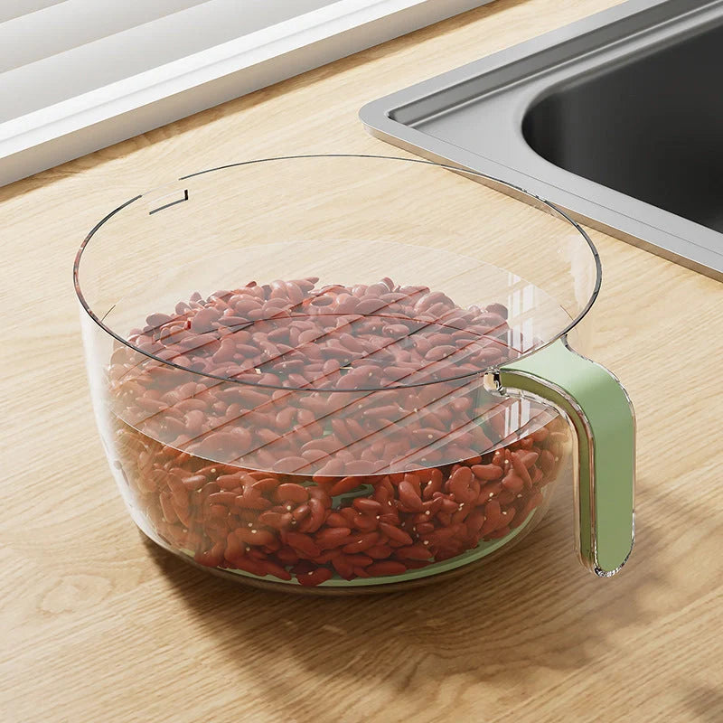 Multifunctional kitchen drainage basin in light green and white for efficient fruit and vegetable washing