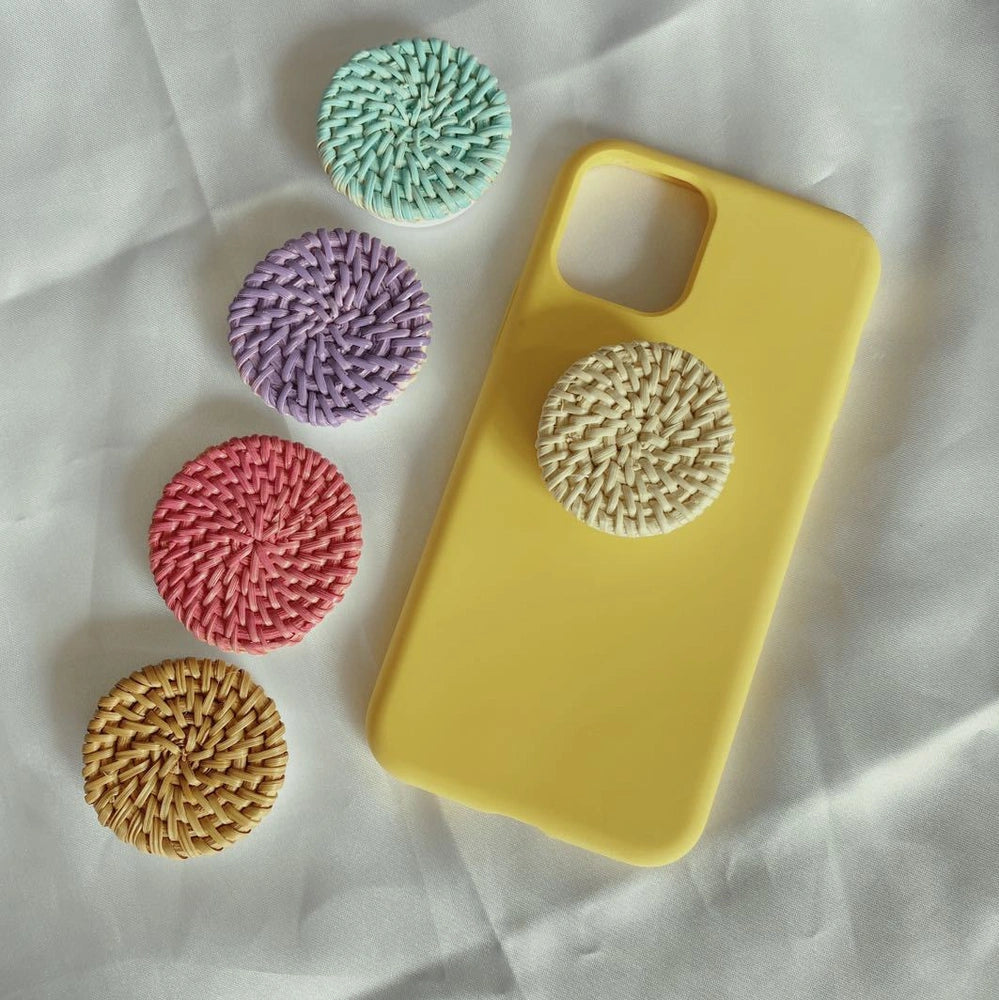 Bamboo woven telescopic phone stand extended to 25cm height holding smartphone