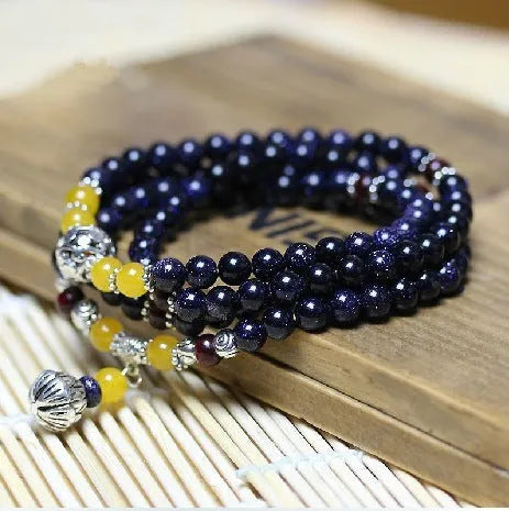 Blue San beads ethnic bracelet showing manual bead construction and circular wrapping design