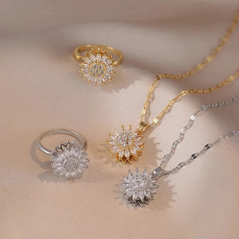 Sunflower-themed stainless steel jewellery set with zircon accents, including necklace, earrings, and ring