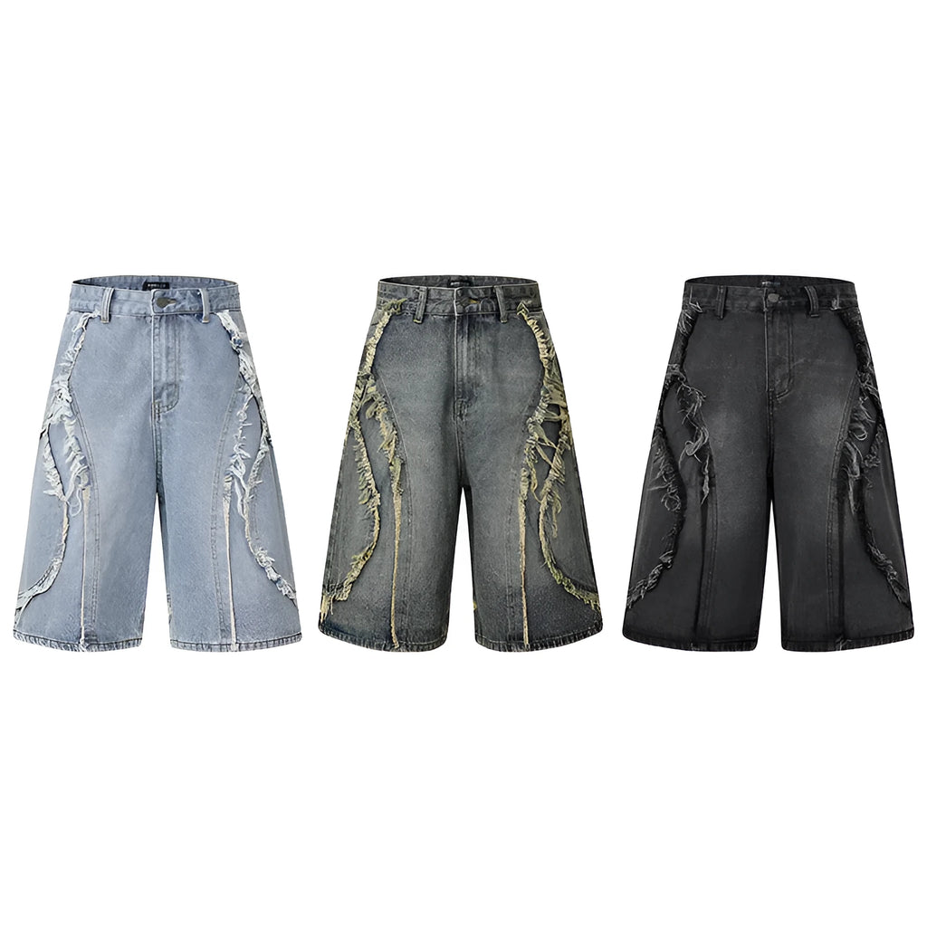 Distressed denim shorts with raw edge detailing in straight leg cropped cut
