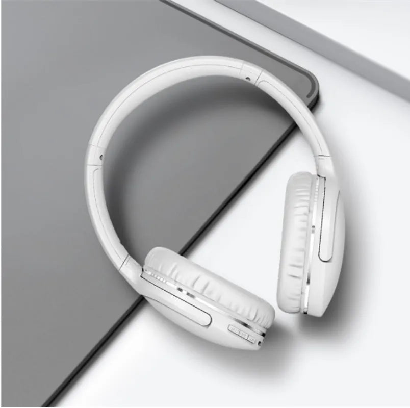 Black and white wireless Bluetooth gaming headset with sports design showing ear cushions and adjustable headband