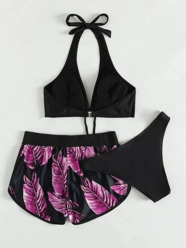 Chic leaf-patterned women's swimsuit set with bikini top, bottoms, and matching shorts in various vibrant colors
