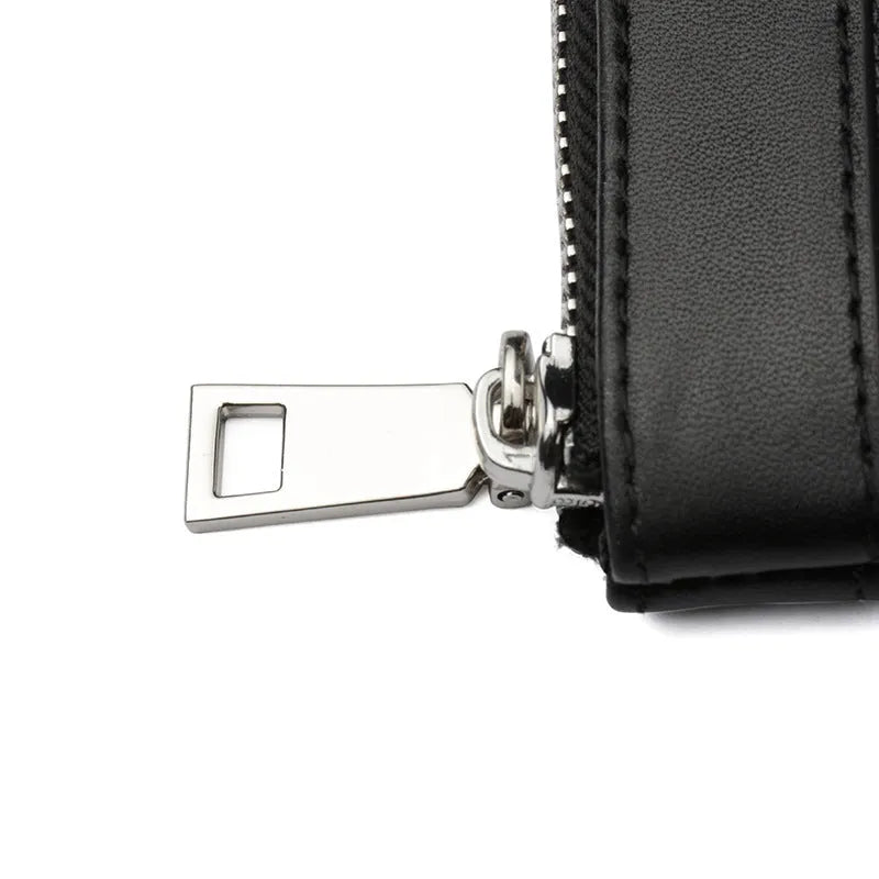Black men's cowhide leather clutch wallet showing front view and open interior with polyester lining
